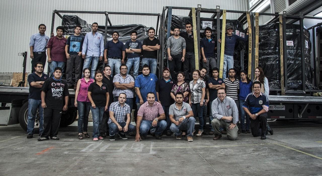 Growing AMD Machines team shipping automation equipment