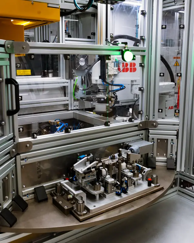 Rotary dial assembly machine with an ABB robot, built by AMD Machines