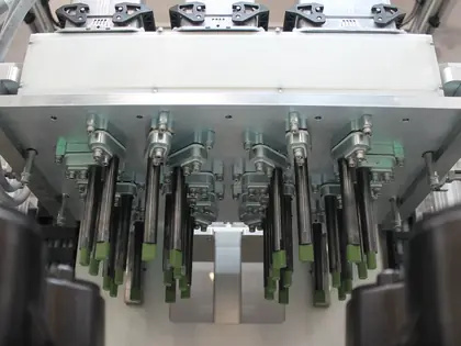 Automated welding system with robotic welder in production environment