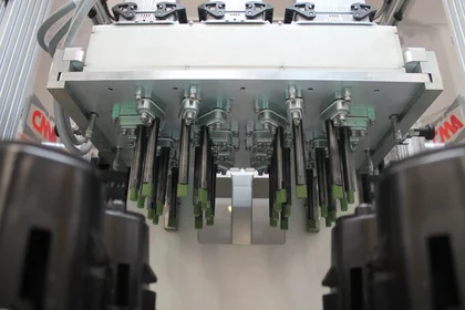 Automated welding system with robotic welder in production environment